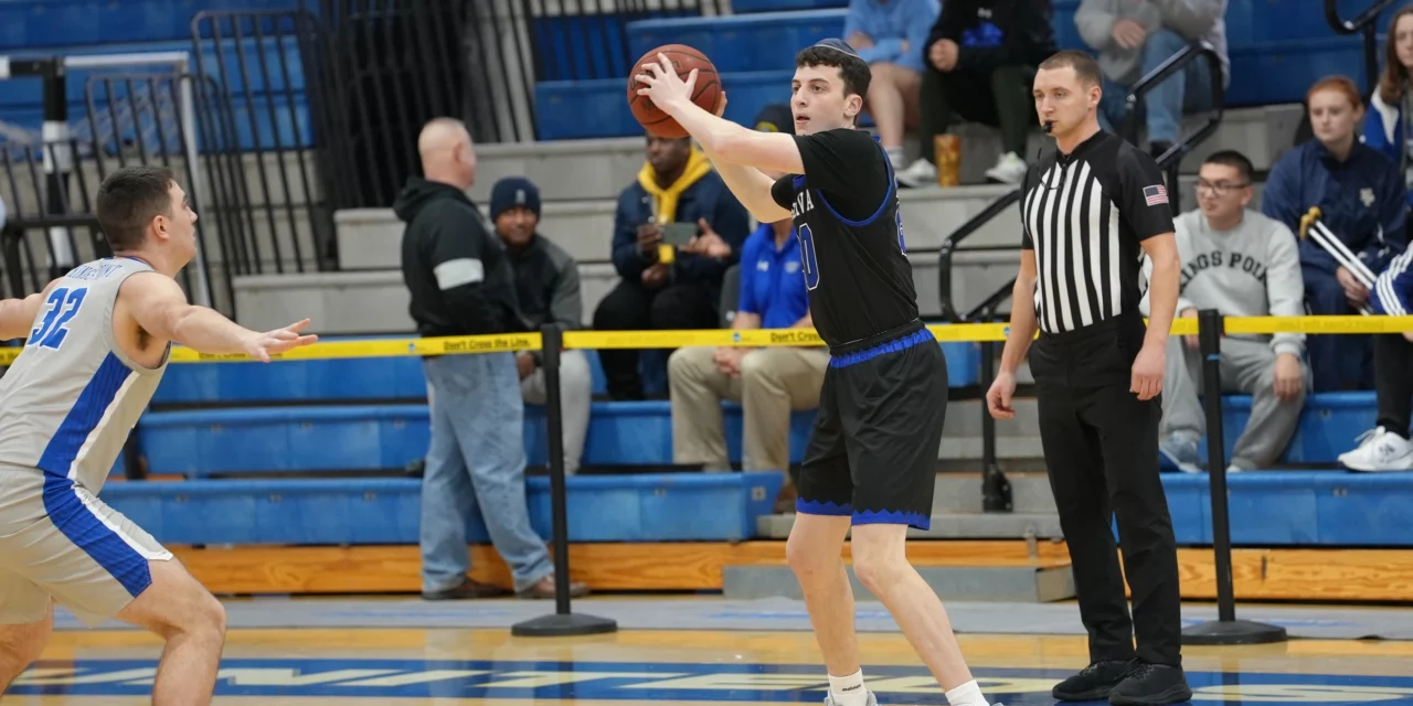 <em>Mariners Dominate the paint; Hold Off Macs</em>