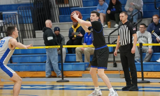 <em>Mariners Dominate the paint; Hold Off Macs</em>