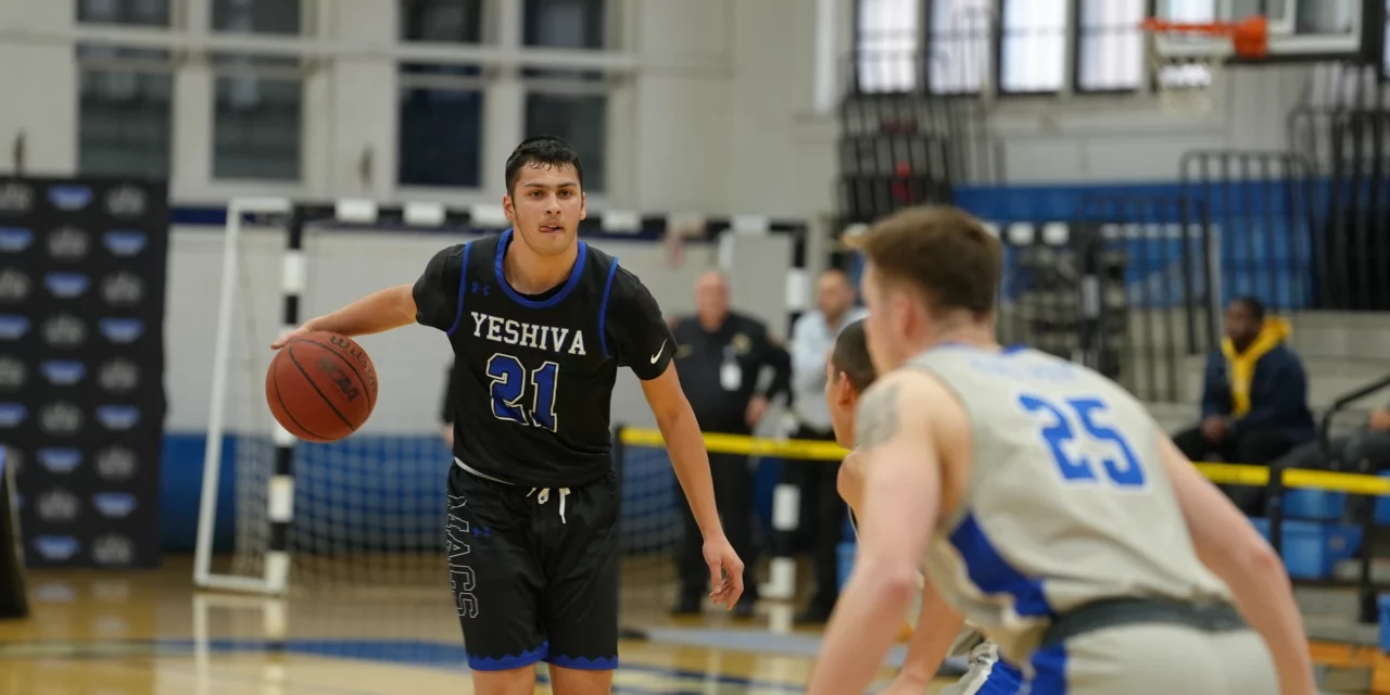 <em>Macs Tame the Bears, Win 75-55</em>