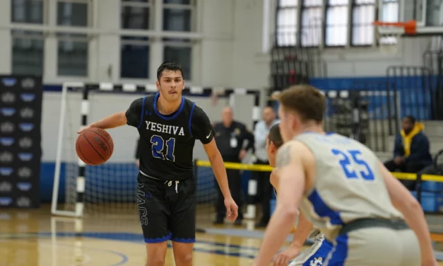 <em>Macs Tame the Bears, Win 75-55</em>