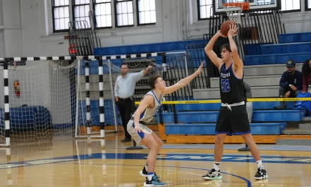 <em>Second Half Surge Guides Macs to Victory</em>